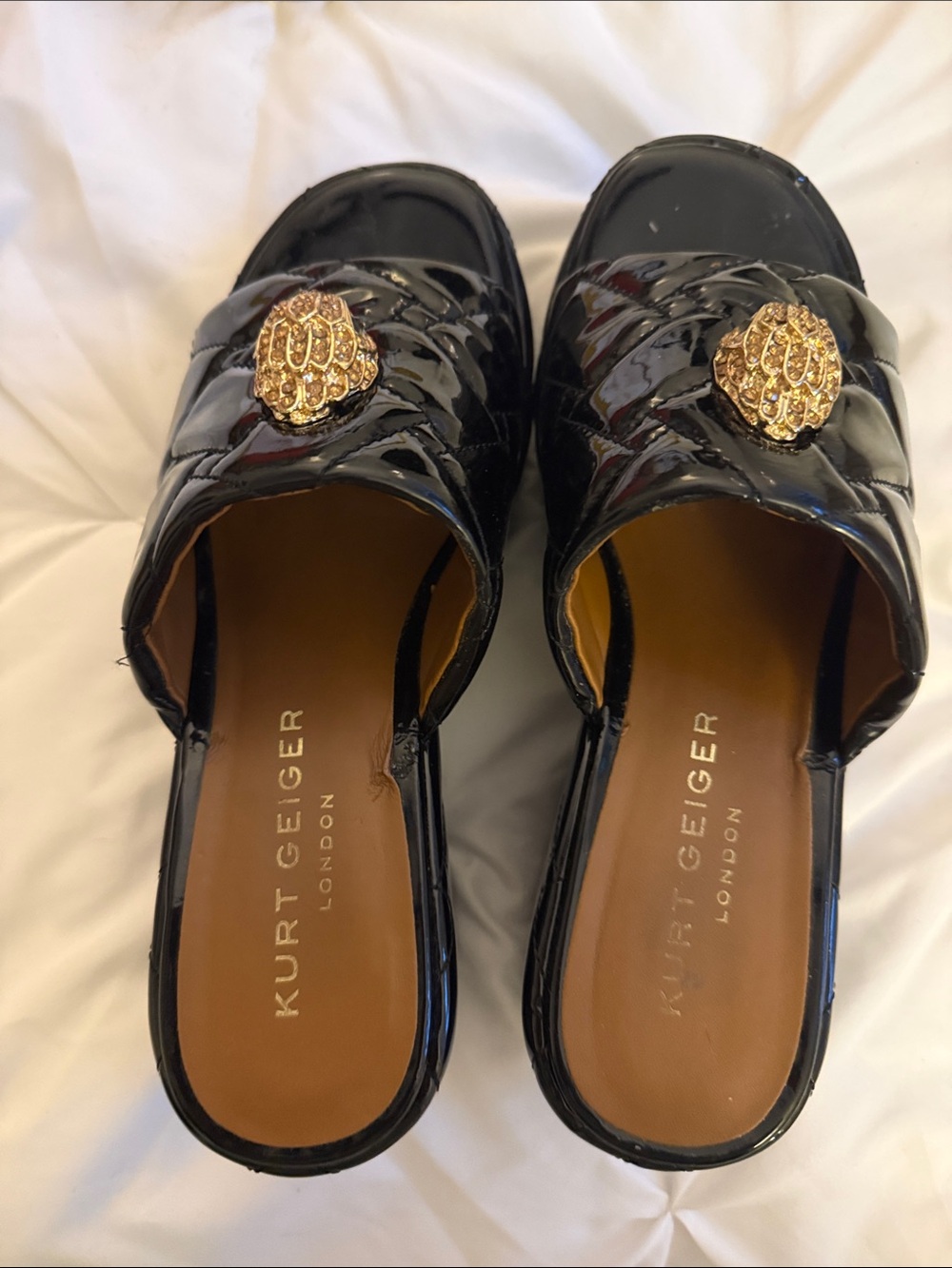 Kurt Geiger Black Patent Quilted Slide Mules with Gold Medallions